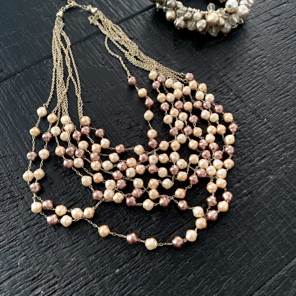 Pearl necklace and bracelet the pearls are cream and tan colors